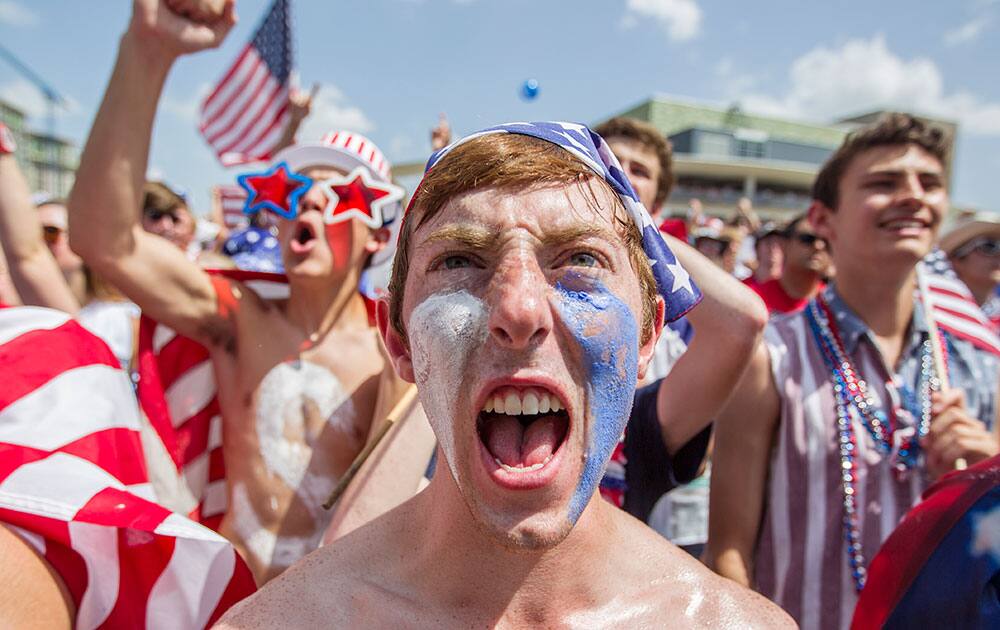 Matt Jones of Austin watches the U.S. play Belgium in a World Cup soccer match  at the Long Center in Austin, Texas.