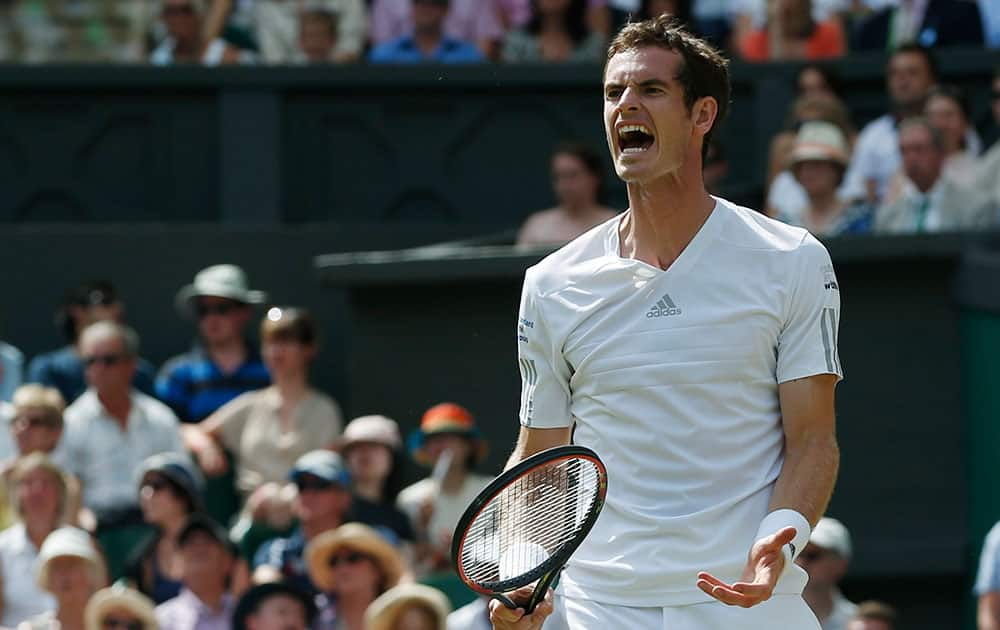 Andy Murray of Britain reacts in frustration during his men's singles quarterfinal match against Grigor Dimitrov of Bulgaria at the All England Lawn Tennis Championships in Wimbledon.