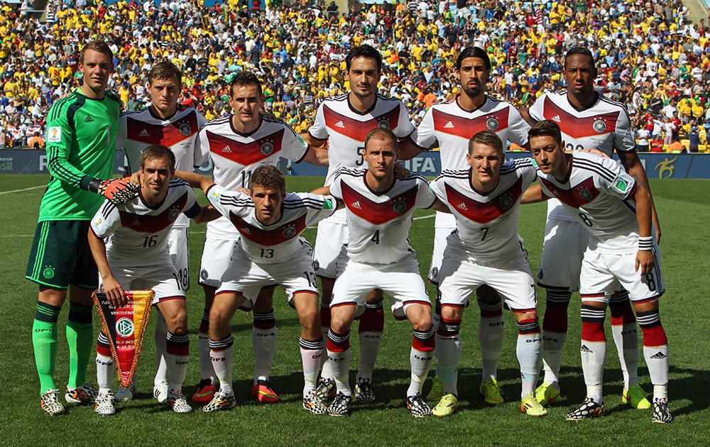 The German team poses for a group photo before the World Cup quarterfinal soccer match between Germany and France at the Maracana Stadium in Rio de Janeiro, Brazil.