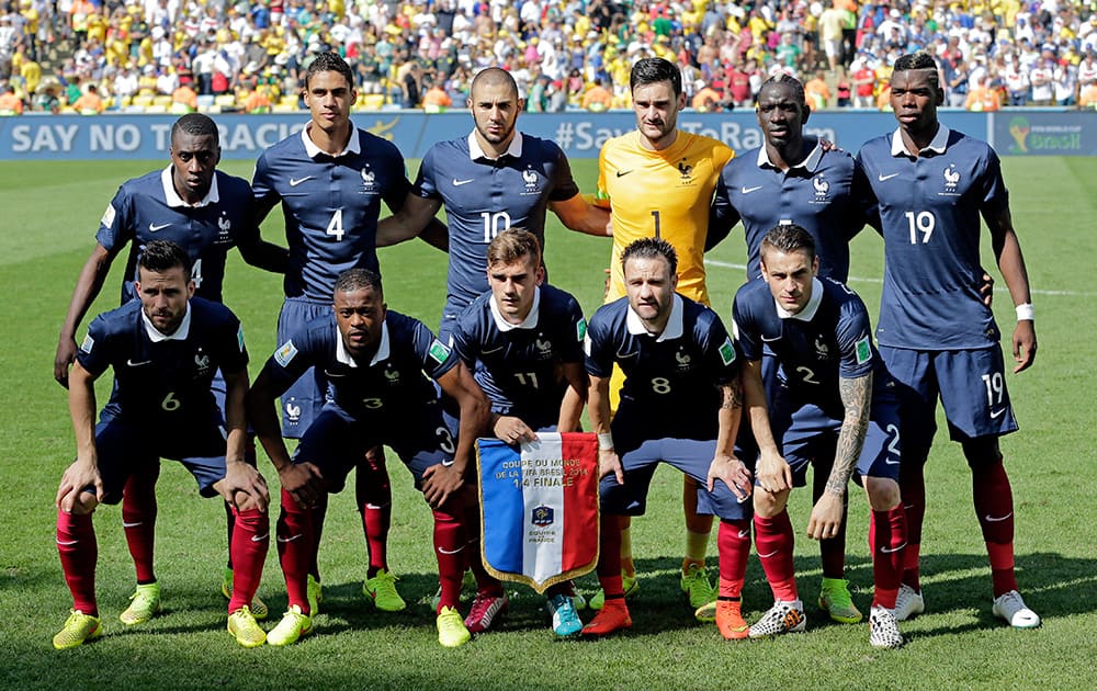 France's national team poses before the World Cup quarterfinal soccer match between Germany and France at the Maracana Stadium in Rio de Janeiro, Brazil.