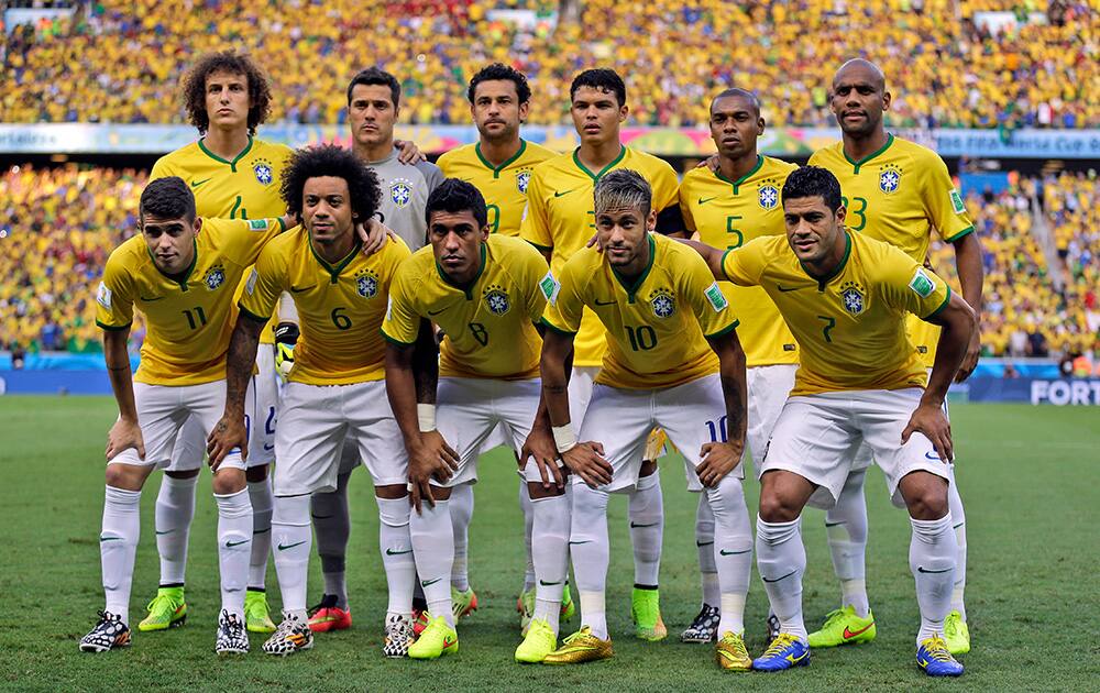 Brazil's national team poses before the World Cup quarterfinal soccer match between Brazil and Colombia at the Arena Castelao in Fortaleza, Brazil.