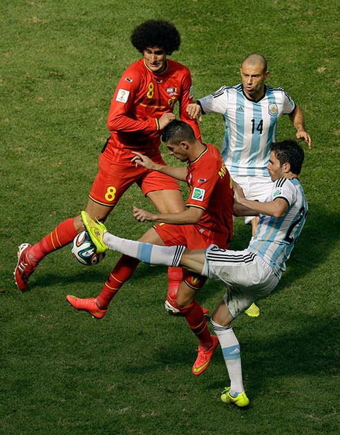 Argentina's Jose Maria Basanta, right, fights for the ball with Belgium's Kevin Mirallas during the World Cup quarterfinal soccer match between Argentina and Belgium at the Estadio Nacional in Brasilia, Brazil.