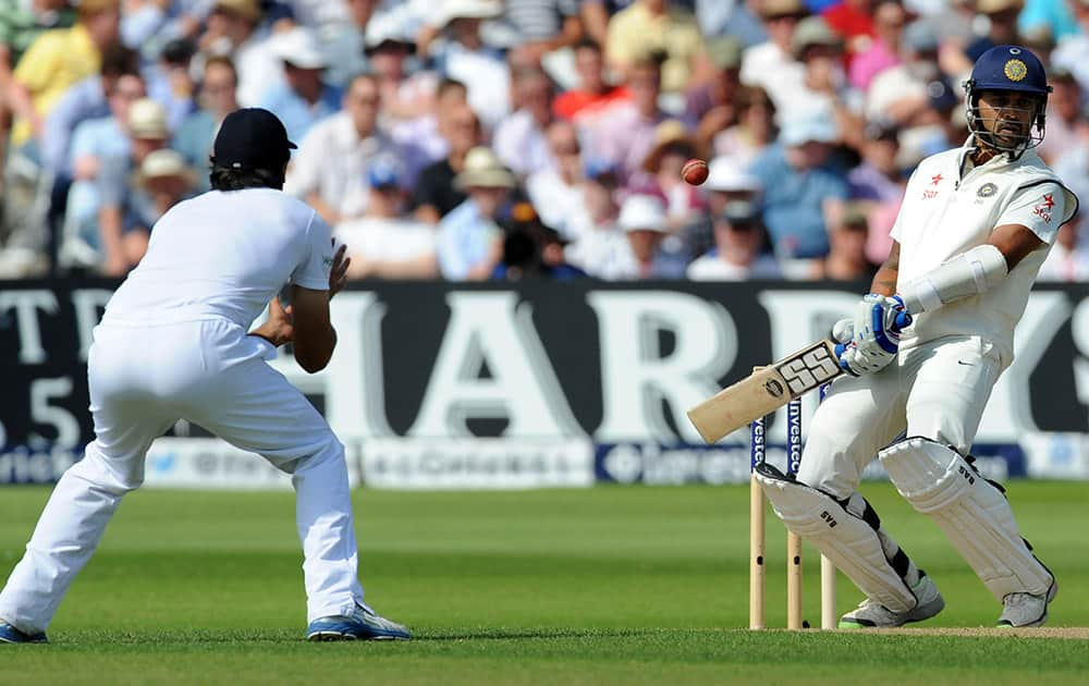 India's Murali Vijay, right, avoids a bouncer during day one of the first Test between England and India at Trent Bridge cricket ground, Nottingham.