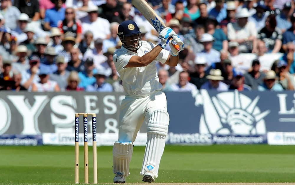 M.S. Dhoni plays a shot during day two of the first Test between England and India at Trent Bridge cricket ground, Nottingham, England.