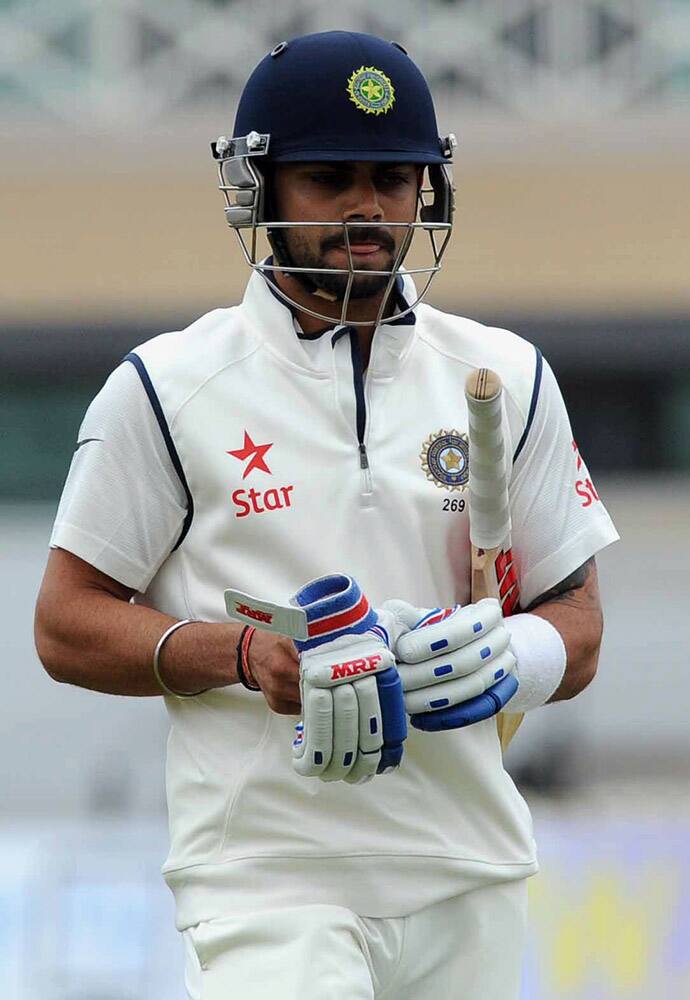 India's Virat Kohli walks back to the pavilion after getting out LBW for 8 runs by England's Stuart Broad during day five of the first Test between England and India at Trent Bridge cricket ground, Nottingham, England.