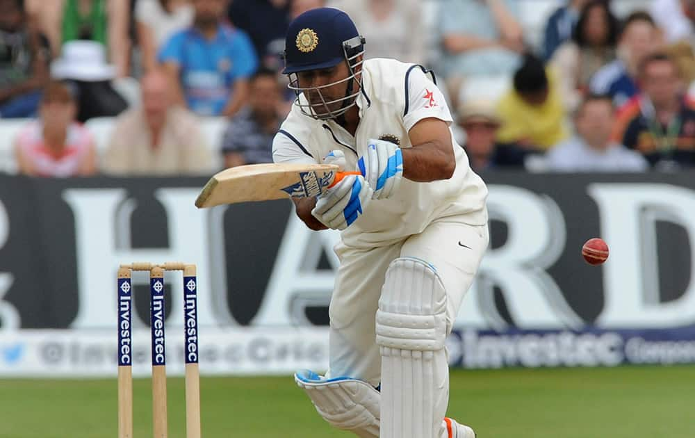 India's M. S. Dhoni plays a shot during day five of the first Test between England and India at Trent Bridge cricket ground, Nottingham, England.