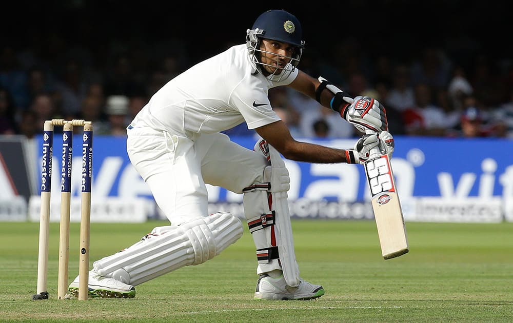 Bhuvneshwar Kumar plays a shot off the bowling of England's Ben Stokes during the first day of the second test match between England and India at Lord's cricket ground in London.