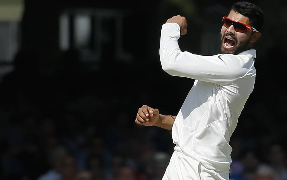 India's Ravindra Jadeja celebrates the wicket of England's Joe Root during the second day of the second test match between England and India at Lord's cricket ground in London.