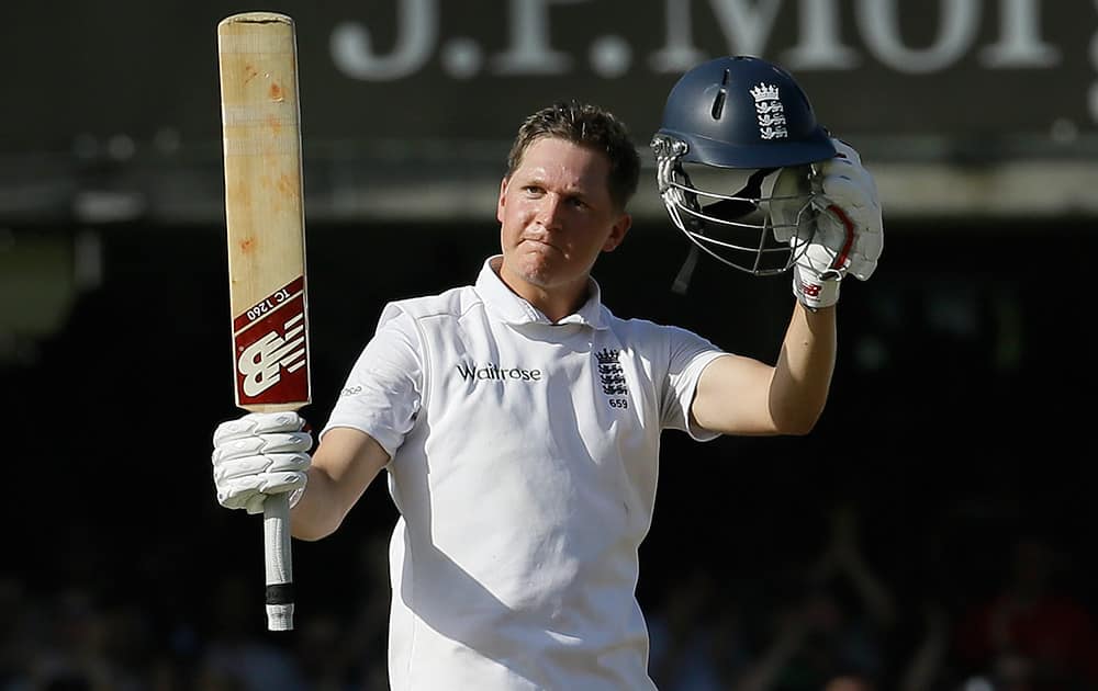 England's Gary Ballance celebrates scoring a century during the second day of the second test match between England and India at Lord's cricket ground in London.