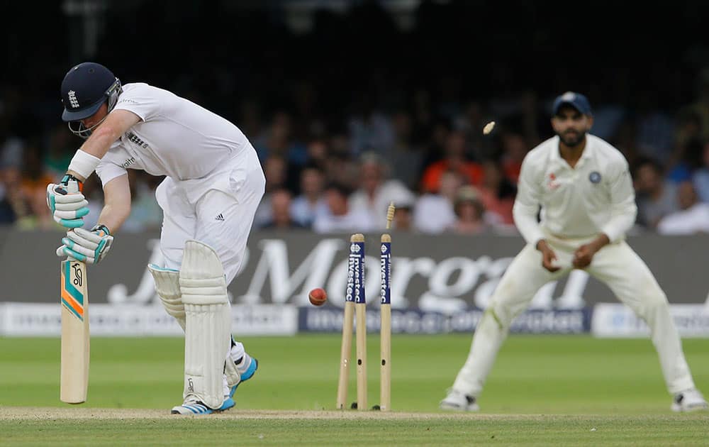 England's Ian Bell is bowled by India's Ishant Sharma during the fourth day of the second test match between England and India at Lord's cricket ground in London.