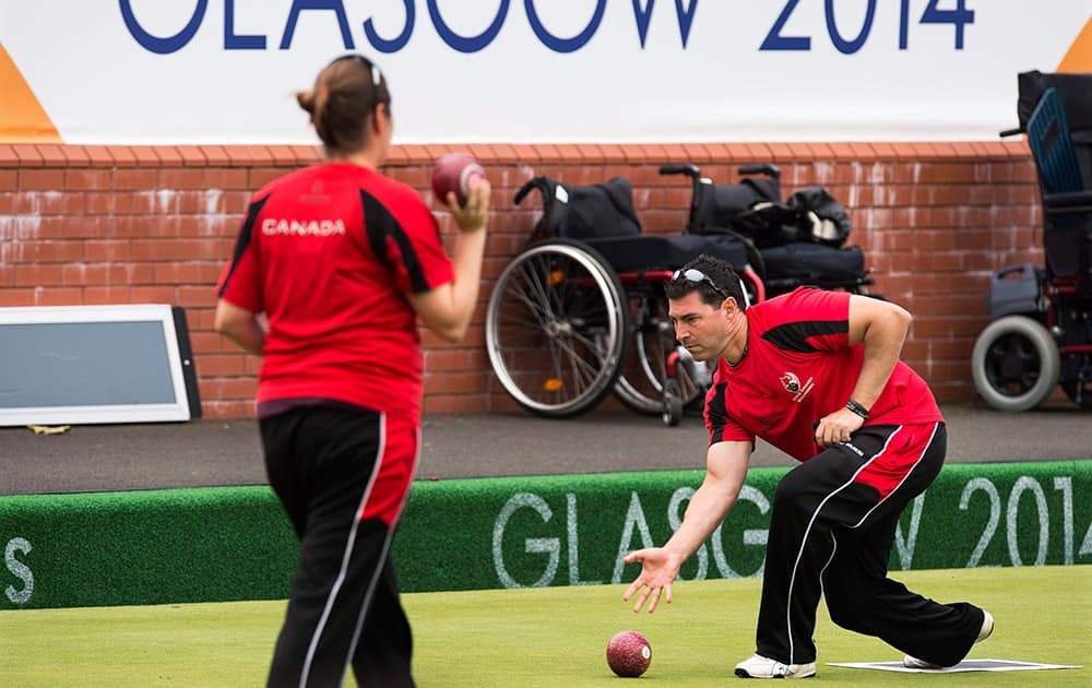 Lawn bowler Tim Mason practices at the Kelvingrove Lawn Bowls Centre at the Commonwealth Games in Glasgow, Scotland.