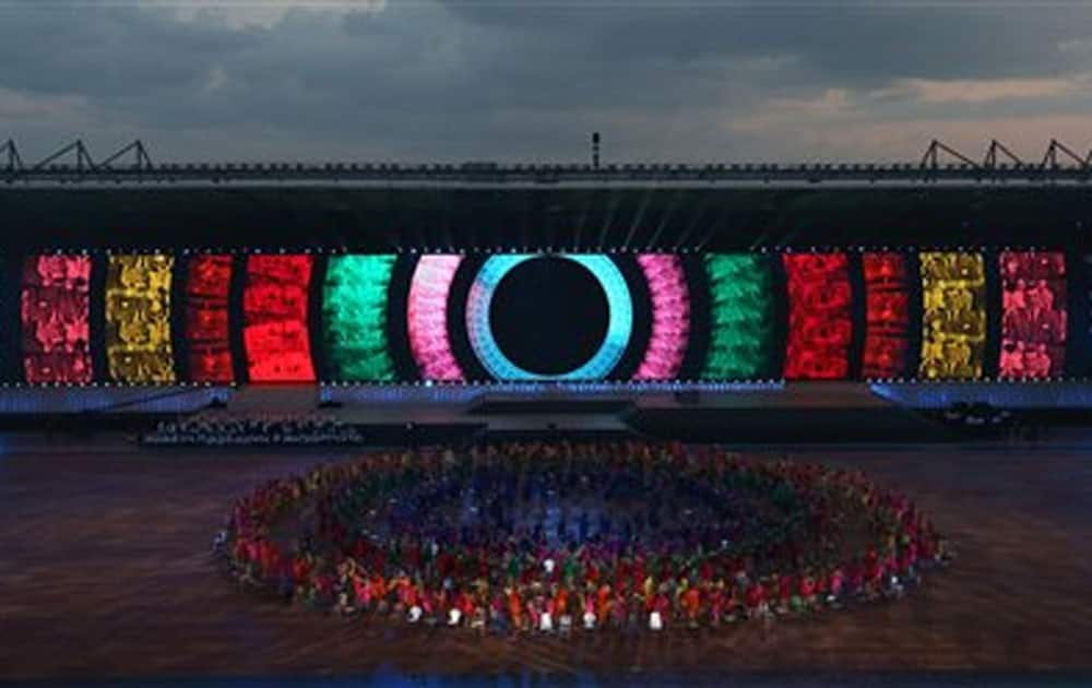 Performers take part in the opening ceremony for the Commonwealth Games 2014 in Glasgow.