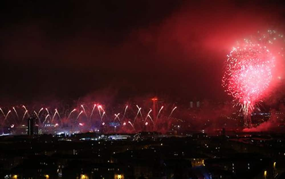 Fireworks explode over the river Clyde as they mark the opening of the Commonwealth Games Glasgow 2014.