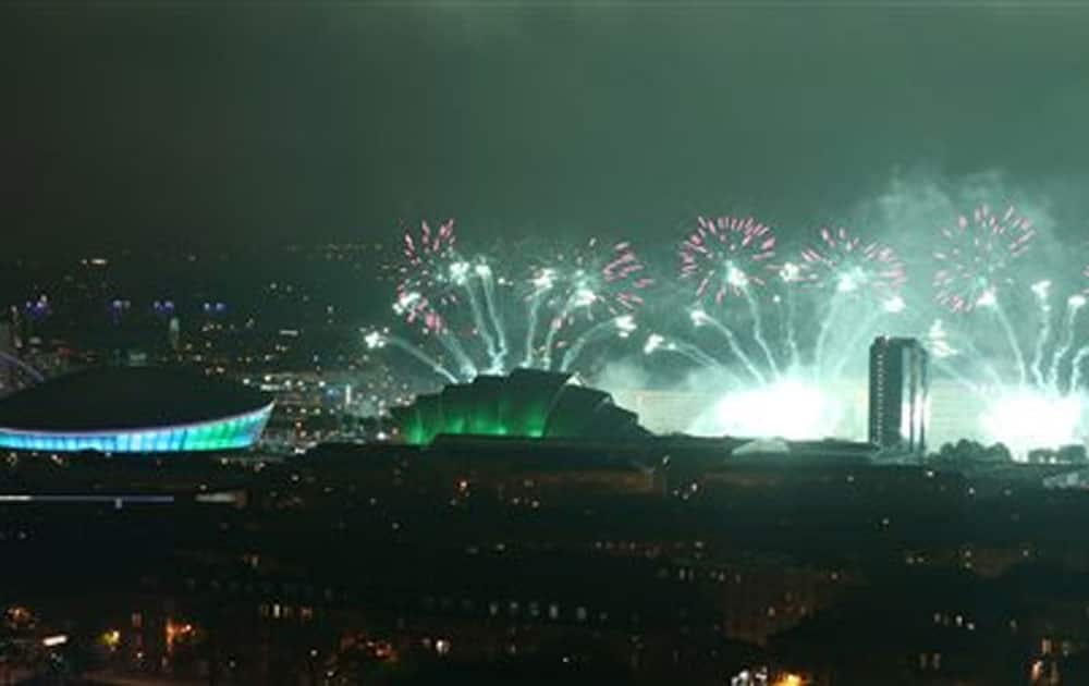 Fireworks explode over the river Clyde as they mark the opening of the Commonwealth Games Glasgow 2014, in Glasgow.