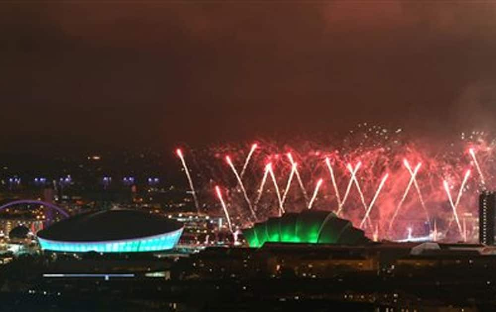 Fireworks explode over the river Clyde as they mark the opening of the Commonwealth Games Glasgow 2014, in Glasgow.