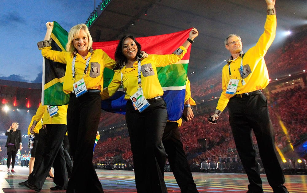 South African athletes react as they arrive in the stadium during the opening ceremony for the Commonwealth Games 2014 in Glasgow, Scotland.