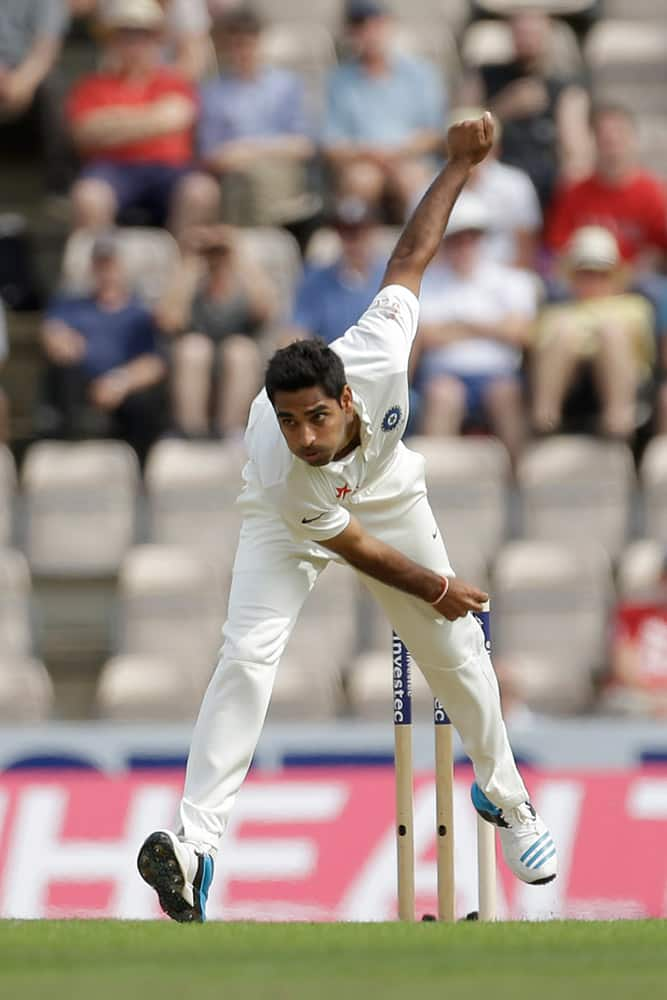 India's Bhuvneshwar Kumar bowls during the first day of the third cricket test match of the series between England and India at The Ageas Bowl in Southampton, England.