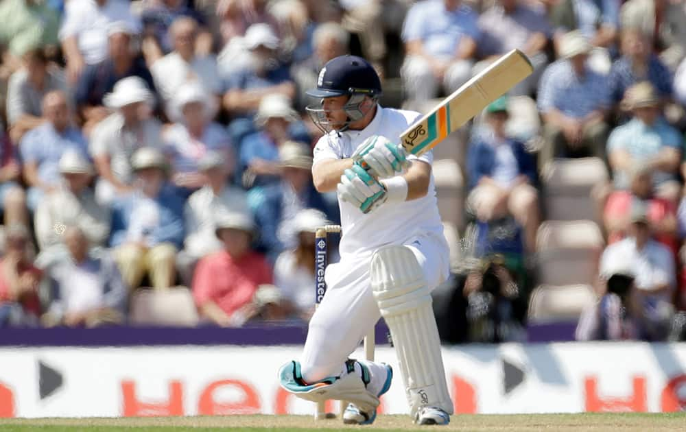 England's Ian Bell crouches down after playing a shot during the second day of the third cricket test match of the series between England and India at The Ageas Bowl in Southampton, England.