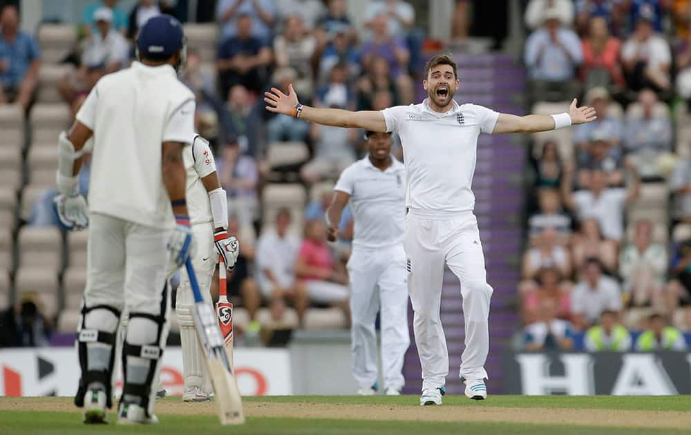 England's James Anderson, right, makes an unsuccessful wicket appeal for India's Cheteshwar Pujara, second left obscured, during the second day of the third cricket test match of the series between England and India at The Ageas Bowl in Southampton.