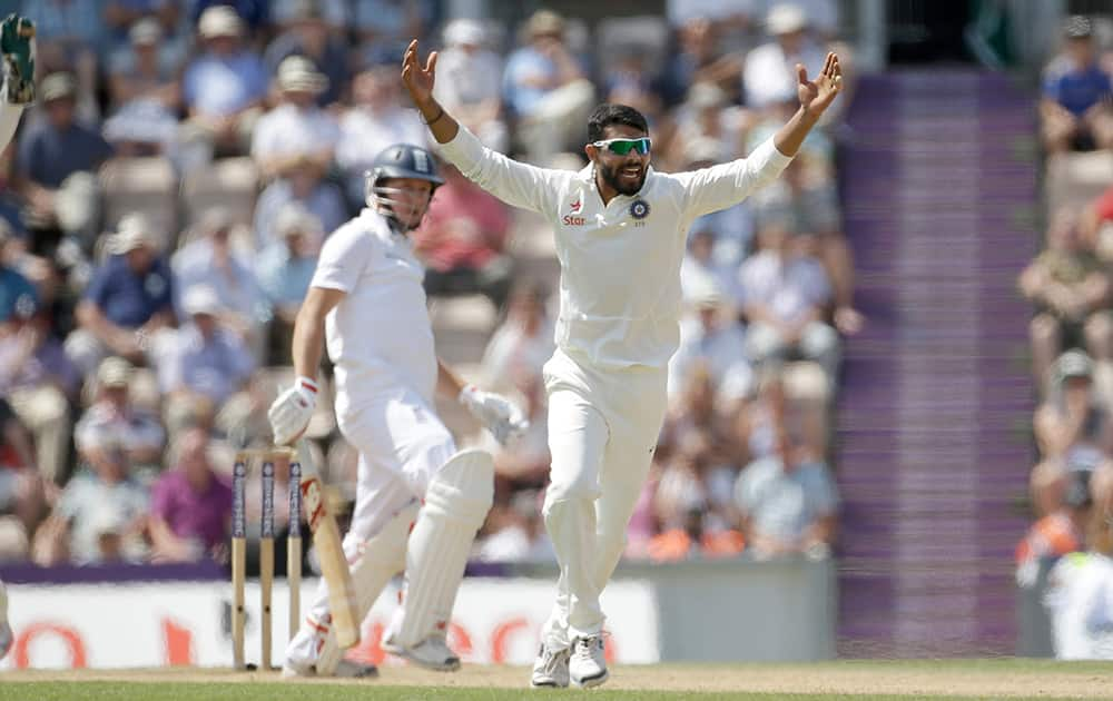 India's Ravindra Jadeja successfully appeals for the wicket of England's Gary Ballance during the fourth day of the third cricket test match of the series between England and India at The Ageas Bowl in Southampton, England.