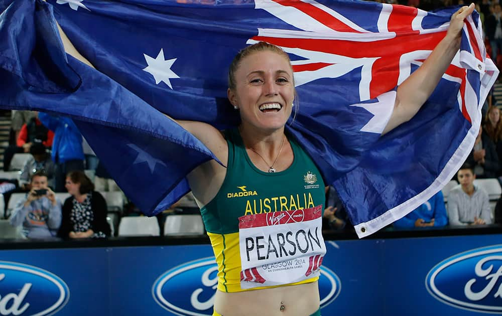 Sally Pearson of Australia celebrates after winning the 100m hurdles at Hampden Park Stadium during the Commonwealth Games 2014 in Glasgow.