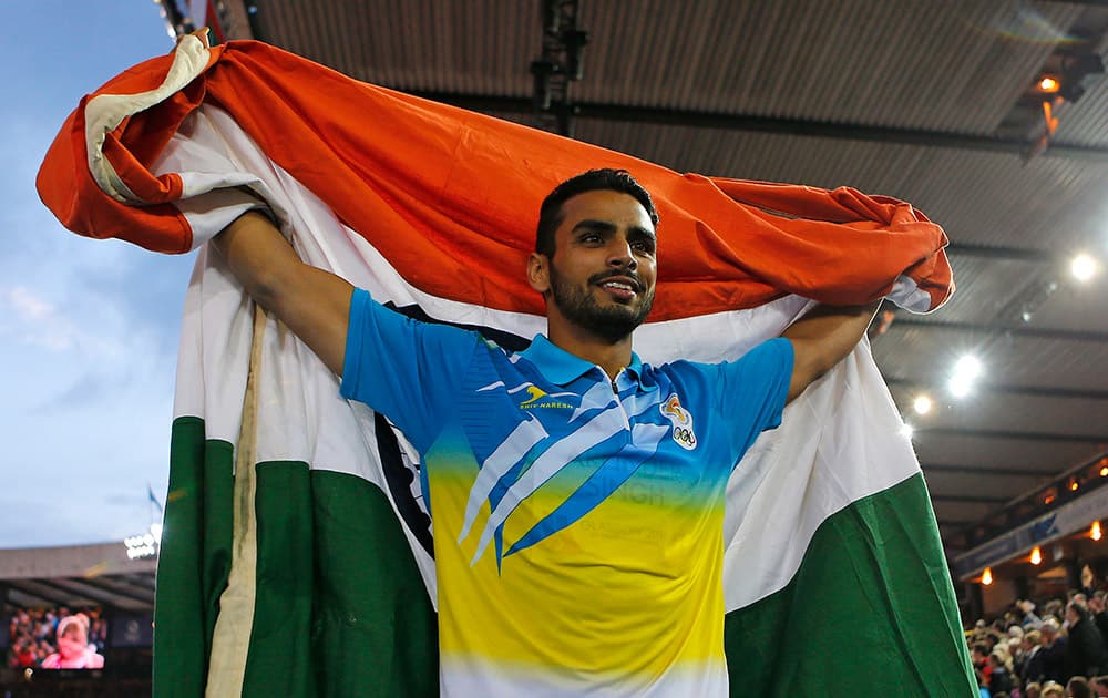 India's Arpinder Arpinder Singh celebrates after the final of the Men's triple jump at Hampden Park Stadium during the Commonwealth Games 2014 in Glasgow, Scotland.