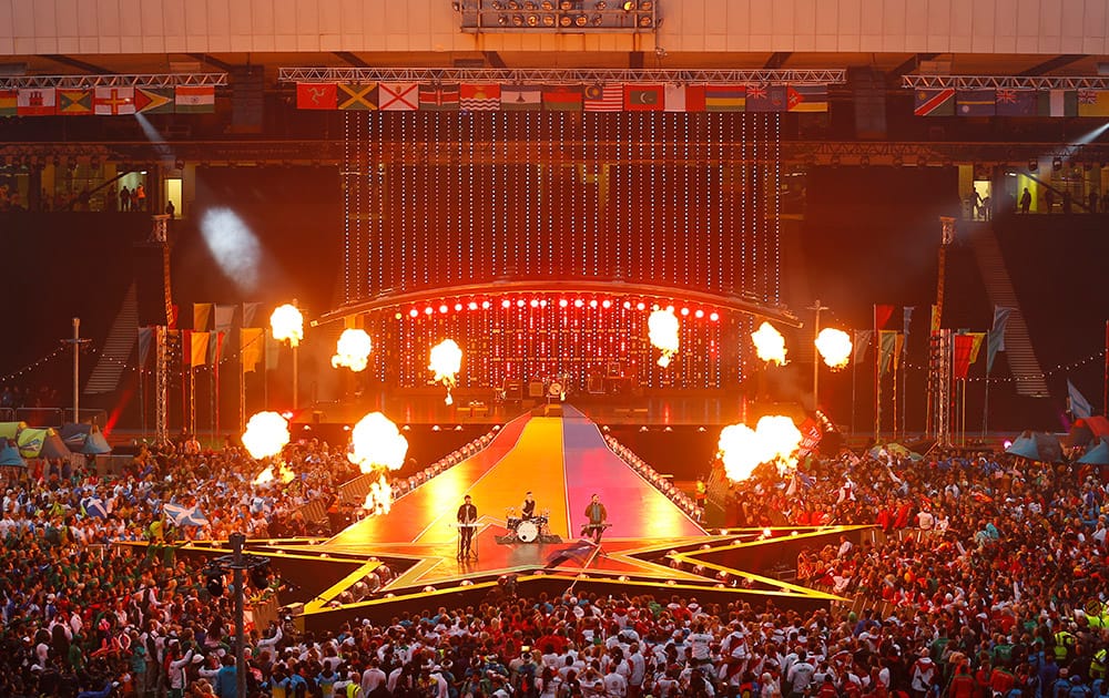 A local Glasgow band Prides plays to the assembled crowd as pyrotechnics explode during the Closing Ceremony for the Commonwealth Games Glasgow 2014, at Hampden Park stadium, in Glasgow, Scotland.