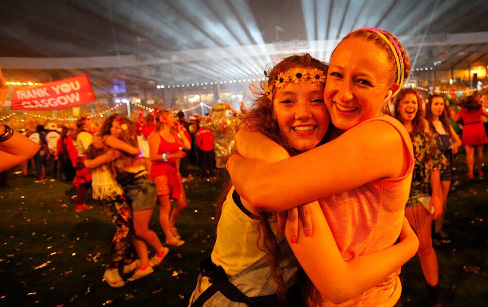 Games-makers and cast members enjoy the post show atmosphere following the Closing Ceremony for the Commonwealth Games Glasgow 2014, at Hampden Park stadium, in Glasgow, Scotland.