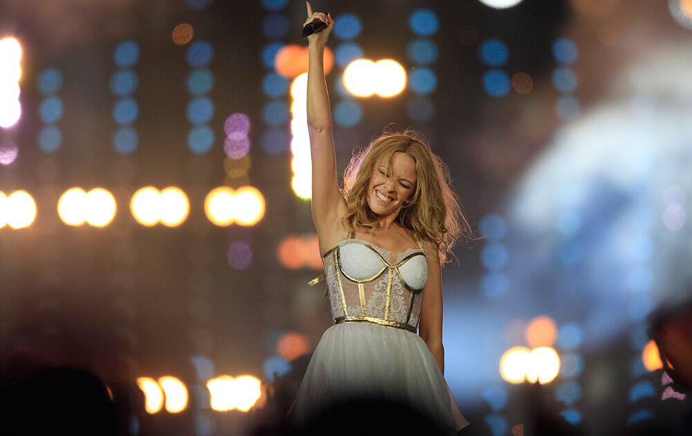 Australian pop singer Kylie Minogue performs on stage during the Closing Ceremony for the Commonwealth Games Glasgow 2014, at Hampden Park stadium, in Glasgow, Scotland.