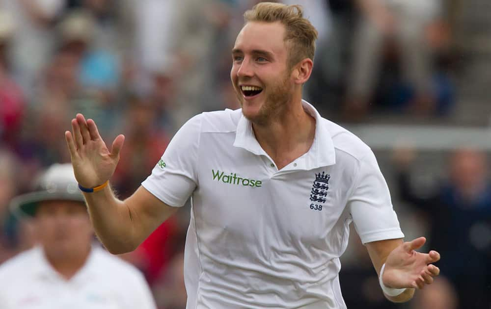 England's Stuart Broad celebrates after taking the wicket of India's Cheteshwar Pujara for 0 at Old Trafford cricket ground on the first day of the fourth test match of their five match series, in Manchester, England.