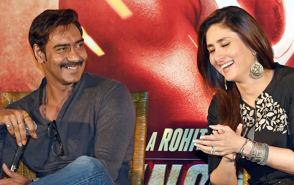 Bollywood actress Ajay Devgn and Kareena Kapoor Khan during promotion of Singham Returns in Kolkata.