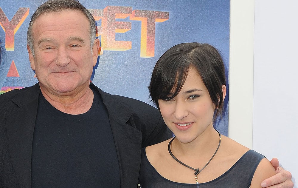 FILE - This Nov. 13, 2011 file photo shows actor Robin Williams, left, and his daughter, Zelda at the premiere of `Happy Feet Two` in Los Angeles. Williams, whose free-form comedy and adept impressions dazzled audiences for decades, has died in an apparent suicide.