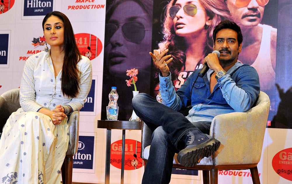 Bollywood actress Ajay Devgn and Kareena Kapoor Khan during promotion of 'Singham Returns'.