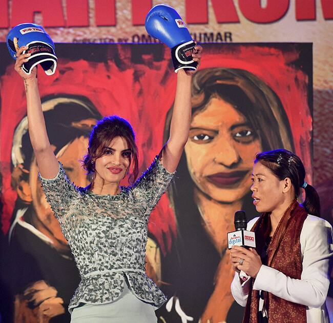 Bollywood actress Priyanka Chopra with World Champion Boxer MC Mary Kom during the promotion of Sanjay Leela Bhansali's forthcoming film Mary Kom, in Mumbai.