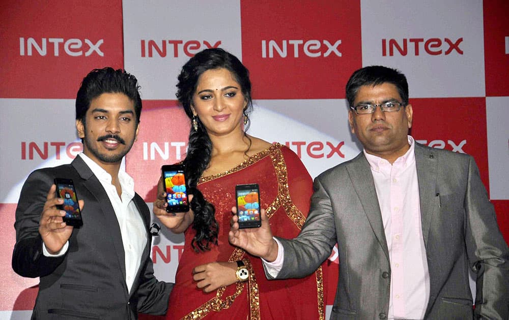 Launch of Intex Aqua smartphone by Tollywood actor Anushka Shetty and director Keshav Bansal, in Hyderabad.