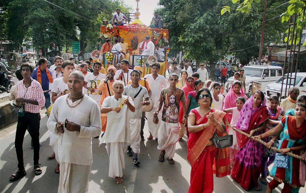  Hindu devotees take part in a religious procession during Shri Krishna Janmashtami celebrations in Allahabad.