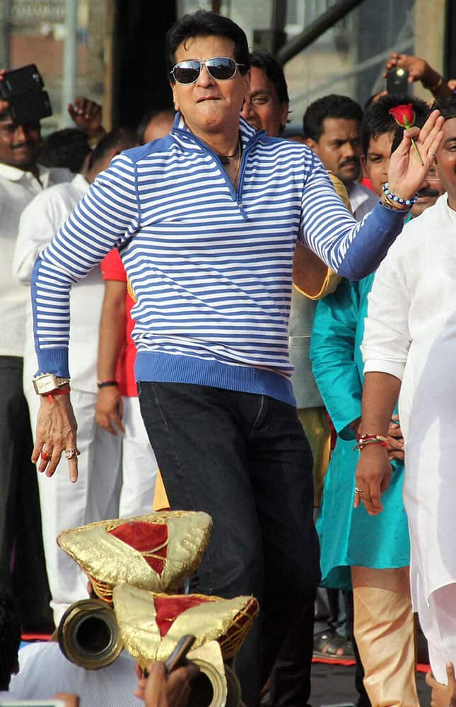 Bollywood actor Jitendra performs at the Janmashtami celebrations in Mumbai.