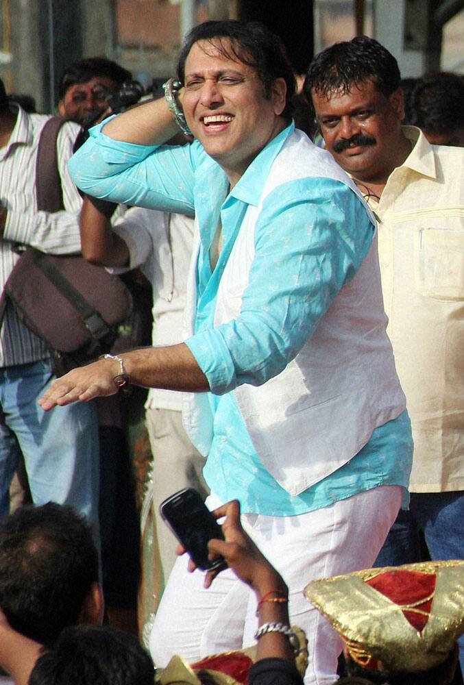 Bollywood actor Govinda perfoms during the Janmashtami celebrations in Mumbai.