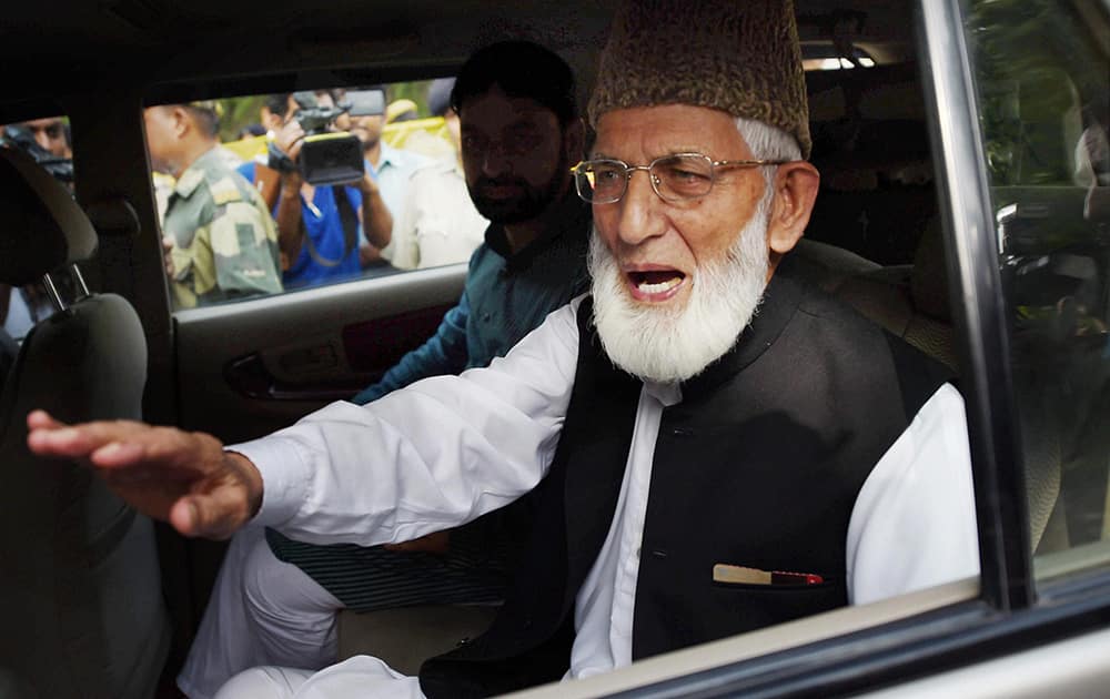 Syed Ali Shah Geelani leaves after a meeting at Pakistan High Commission in New Delhi.