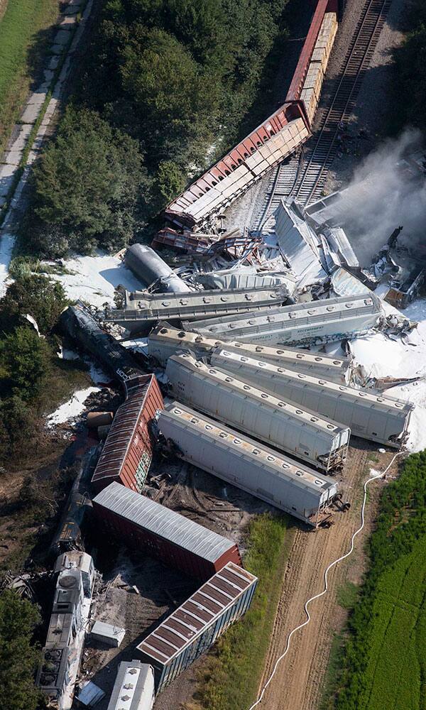 Emergency personnel work at the site of a head-on collision of two Union Pacific trains outside of Hoxie, Ark. in Lawrence County. Arkansas State Police said two Union Pacific train crew members were killed and two others injured in the early morning accident.