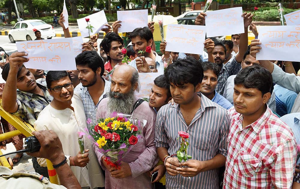 IAS aspirants protest against introduction of CSAT in Civil Services Exams outside the UPSC in New Delhi.