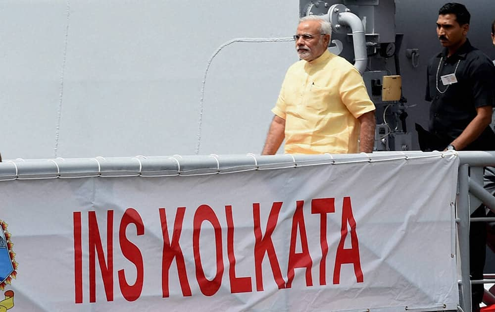 Prime Minister, Narendra Modi along with Admiral RK Dhowan, Chief of Naval Staff during the commissioning ceremony of INS Kolkata (D63), the lead ship of the Kolkata-class guided-missile destroyers at the Naval Dockyard in Mumbai.