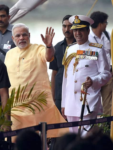 Prime Minister, Narendra Modi along with Admiral RK Dhowan, Chief of Naval Staff during the commissioning ceremony of INS Kolkata (D63), the lead ship of the Kolkata-class guided-missile destroyers at the Naval Dockyard in Mumbai.