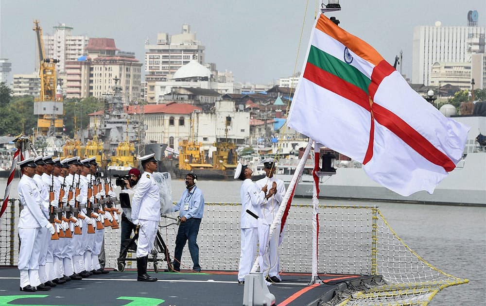 Naval officers leading the commissioning ceremony of INS Kolkata (D63) the lead ship of the Kolkata-class guided-missile destroyers at the Naval Dockyard in Mumbai.