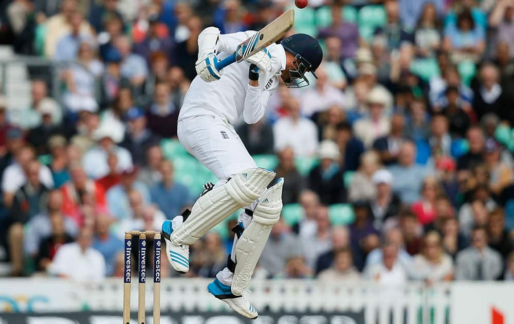 England's Stuart Broad avoids a short ball from India's Ishant Sharma during the third day of the fifth test cricket match at Oval cricket ground in London.