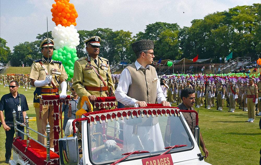 Jammu and Kashmir Chief Minister Omar Abdullah inspecting the parade during Independence Day function at Bakshi Stadium in Srinagar.