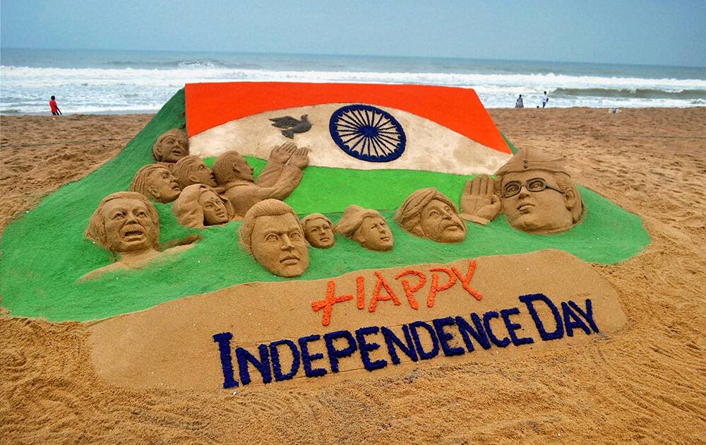 A sand sculpture on eve of Indipendance day at Puri beach.