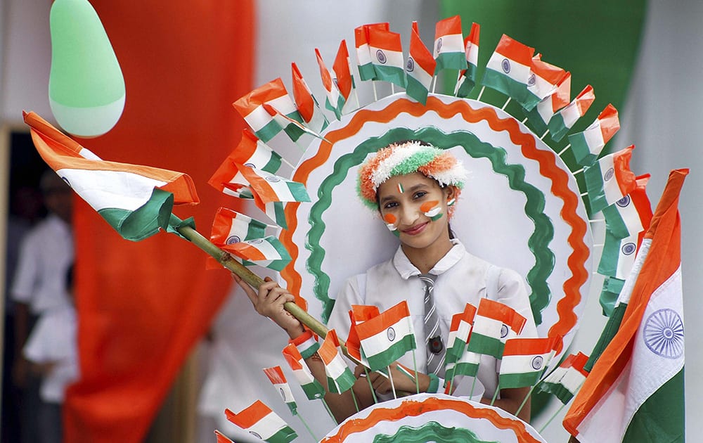 A school student at the full dress rehearsal of Independence Day parade in Ajmer.