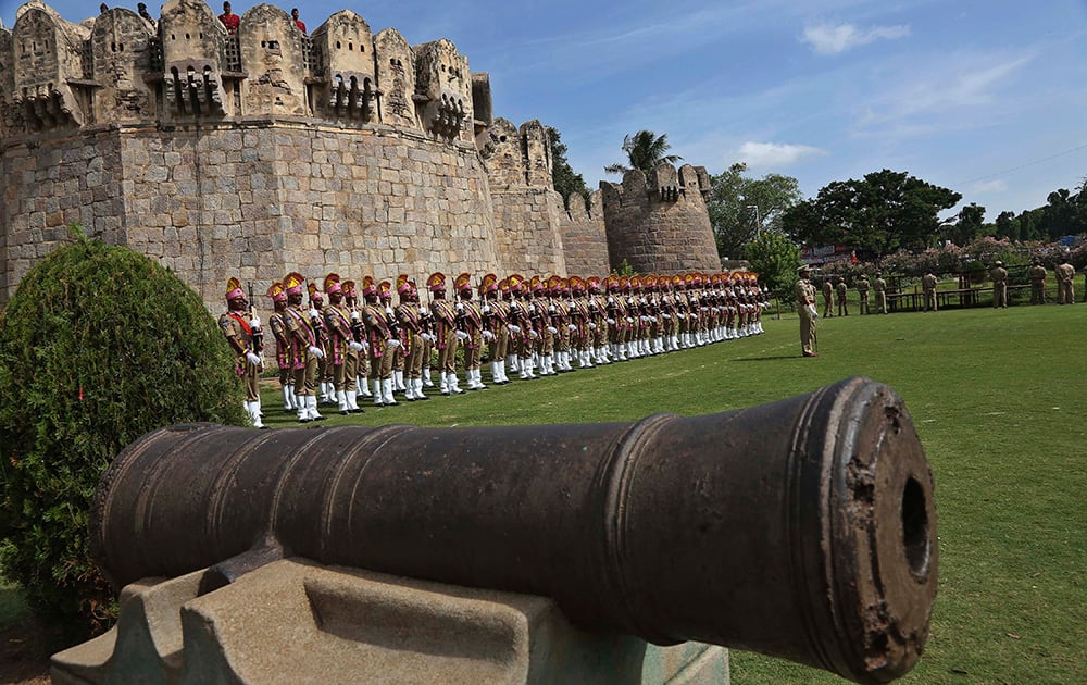 Policemen participate in the final rehearsal for the Independence Day celebrations at the Golconda Fort in Hyderabad.