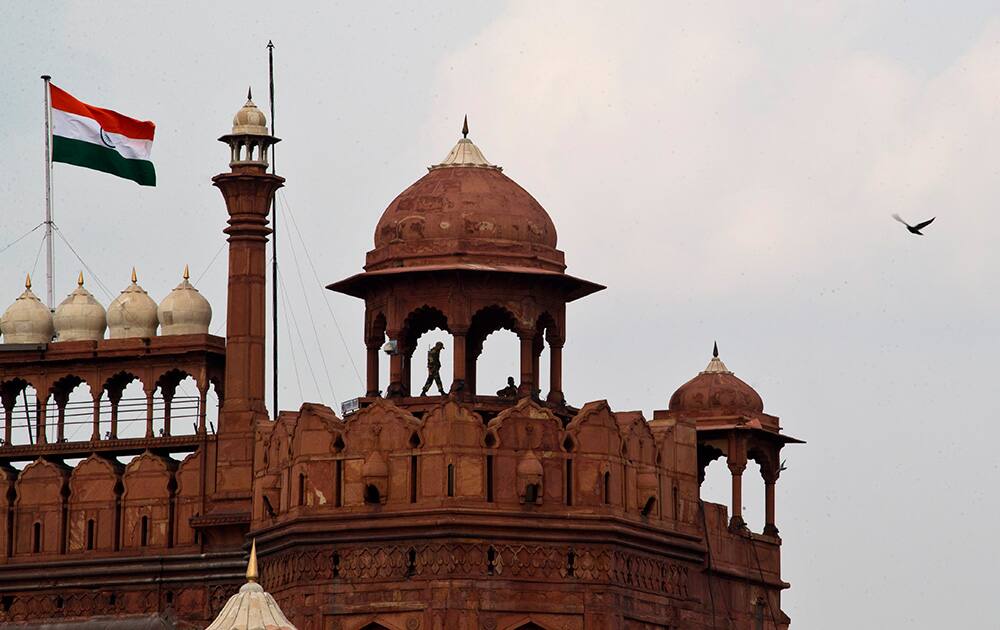 Soldiers secure the historical Red Fort, where Prime Minister Narendra Modi is expected to hoist the national flag and address the nation on Independence Day, in New Delhi.